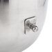 A close-up of a silver Vollrath stainless steel mixing bowl with a metal knob.