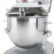 A silver Vollrath commercial mixer with a stainless steel mixing bowl.