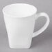 A white 10 Strawberry Street Whittier porcelain mug with a handle.