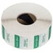 A roll of white labels with green and white text reading "Friday" and "Dissolvable" on a green and white rectangle.