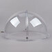 A clear polycarbonate dome with a metal base.
