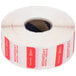 A roll of white tape with red and white Noble Products labels.