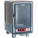A large grey metal Metro C5 heated holding cabinet with a clear glass door.