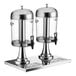 An Acopa stainless steel beverage dispenser stand with two glass containers.