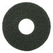 A black circular Scrubble floor pad with a white circle in the middle.