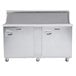 A Traulsen stainless steel refrigerated sandwich prep table with 2 right hinged doors.