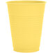 A yellow plastic cup on a white background.