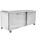 A large Traulsen stainless steel refrigerated sandwich prep table with 1 left hinged door and 1 right hinged door.