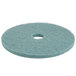 A white package of 5 round blue Scrubble Aqua Burnishing floor pads with a hole in the middle.