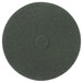 A green 20 inch circular Scrubble floor pad with a hole in the middle.