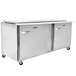A large Traulsen stainless steel refrigerated sandwich prep table with two right hinged doors.
