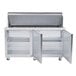 A stainless steel Traulsen refrigerated prep table with two doors on a counter.