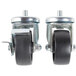 A pair of Traulsen stem casters with black rubber wheels.