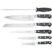 A set of seven Mercer Culinary Renaissance knives with black handles.
