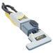 A ProTeam ProForce 1500XP upright vacuum cleaner with grey and yellow accents.