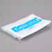 A white plastic bag with blue text that says "Carlisle"
