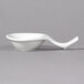 A white porcelain small spoon with a curved handle.
