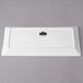 A white rectangular porcelain platter with a logo on it.