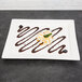 A white rectangular porcelain platter with a chocolate swirl.