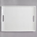 A white rectangular porcelain platter with two handles.