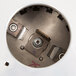 The Short Upper Housing for a Hobart Commercial Garbage Disposer, a circular metal object with screws.