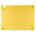 A yellow plastic San Jamar cutting board with a curved handle.