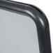 A close up of the black plastic corner of an Aarco Changeable Poster Sign.