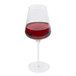 A Stolzle Quatrophil Bordeaux wine glass with red wine in it.