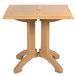 A Grosfillex square molded melamine pedestal table with a teak wood top.