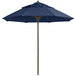 A navy blue Grosfillex Windmaster umbrella on an aluminum pole.