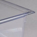 A Vollrath clear polycarbonate food pan with clear edges.