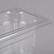 A Vollrath 1/9 size clear plastic food pan with a lid.