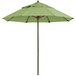 A pistachio green Grosfillex Windmaster umbrella on an aluminum pole.