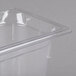 A clear plastic Vollrath food pan with a clear lid.