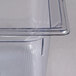 A Vollrath clear plastic food pan with clear edges.