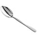 An American Metalcraft stainless steel spoon with a hammered silver handle.