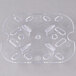 A clear plastic tray with holes.
