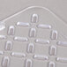 A Vollrath clear polycarbonate drain tray with holes.