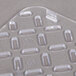 A clear plastic Vollrath Super Pan drain tray with holes.