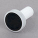 A black and white rubber plunger with a black plastic knob.