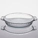 An Anchor Hocking clear glass pie pan with handles.