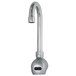 A silver Advance Tabco hands-free wall mount faucet with a black sensor.