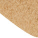 A tan Scrubble floor pad with a brown surface.