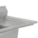 An Advance Tabco stainless steel commercial sink with two compartments and a right side drainboard.