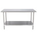 A stainless steel table with a shelf.