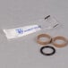 A package for T&S swivel repair kit with a pair of rubber seals and a black rubber ring.