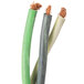 A close up of a green stem with three green and brown wires attached to it.