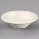 A Homer Laughlin ivory china monkey dish with rolled edges.