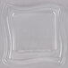 A clear square plastic container lid.
