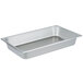 A Vollrath stainless steel deli pan with a lid on a counter.